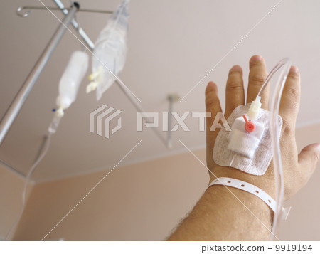 Patient's hand in the hospital with an IV 9919194
