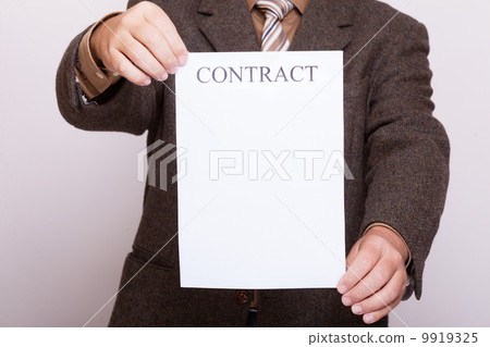 Businessman holding blank paper with sign contract 9919325