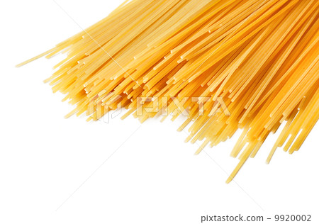Uncooked Italian spaghetti on a white. 9920002