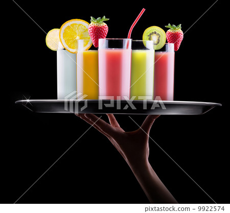 tasty summer fruits with juice in glass 9922574