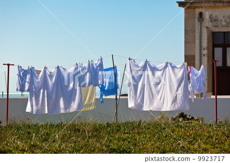 Washing hanging outside an old building, Portugal Coast Washing hanging outside an old building, Portugal Coast 9923717