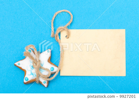 Christmas gingerbread cake star with icing and decoration and blank card 9927201
