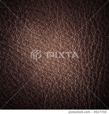 Brown textured leather grunge background closeup 9927356