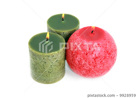 three glowing candles on white three glowing candles on white 9928959