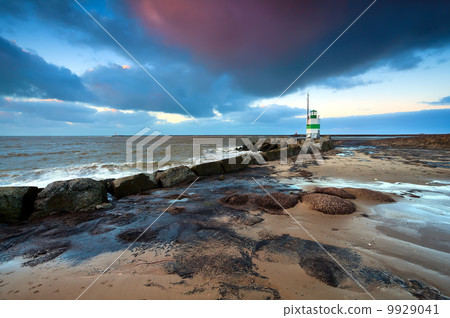 lighthouse on North sea at sunset lighthouse on North sea at sunset 9929041