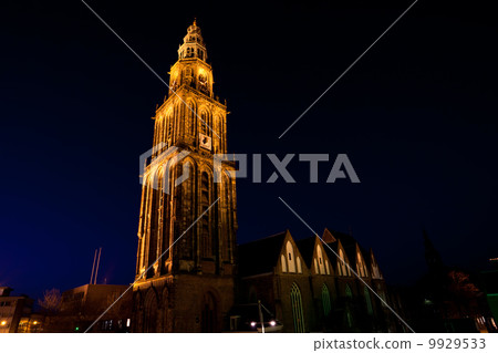 famous Martinitoren (Martini tower) in Groningen at night famous Martinitoren (Martini tower) in Groningen at night 9929533