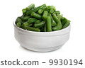 fried green beans in a white cup 9930194