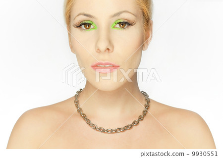 Beautiful blond girl with eyes in green 9930551