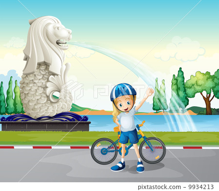 A young biker near the statue of Merlion A young biker near the statue of Merlion 9934213