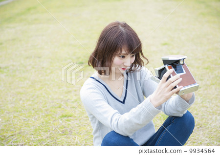 Cute lady with polaroid camera Cute lady with polaroid camera 9934564