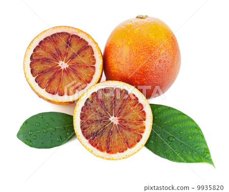 Blood oranges with cut and green leaves isolated on white backgr 9935820