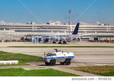 Police vehicle patrols airport in Munich. Police vehicle patrols airport in Munich. 9936650