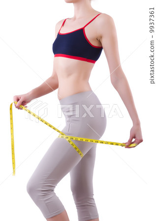 Young girl with centimeter in dieting concept 9937361