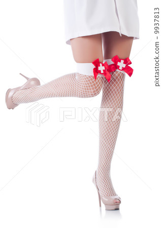 Woman legs with stockings on white 9937813