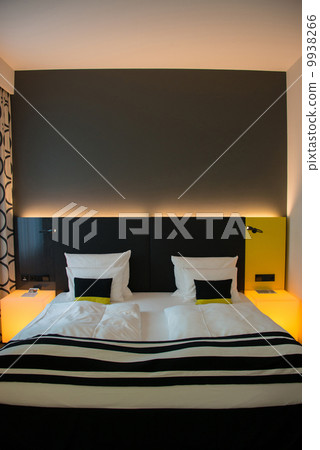 Modern interior of the bedroom 9938266