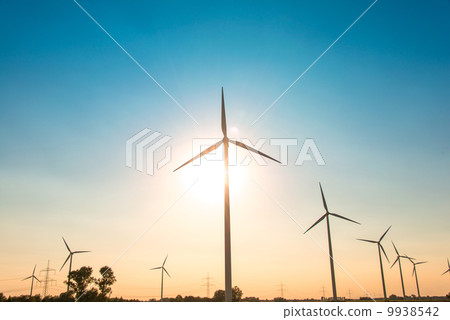 Wind mills during bright summer day 9938542