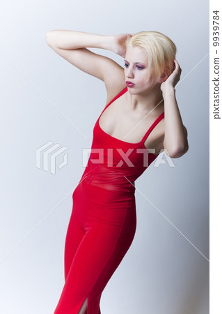 sensual blond girl in red clothes 9939784