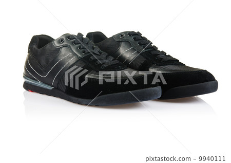 Fashion concept with male shoes on white Fashion concept with male shoes on white 9940111