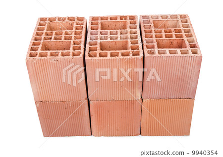 Stack of clay bricks isolated on white Stack of clay bricks isolated on white 9940354