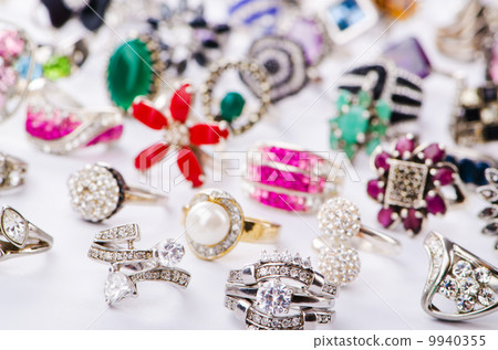 Collection of jewellery rings on white 9940355