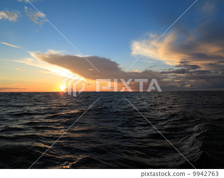 Dramatic sunset over the Baltic sea 9942763