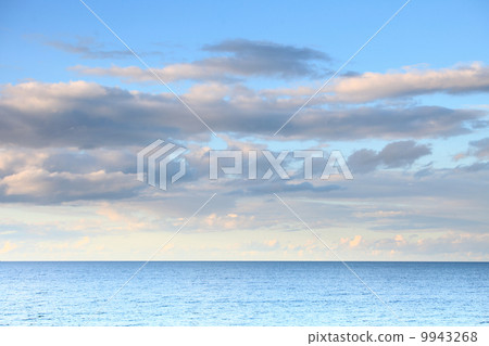 cloudy blue sky leaving for horizon blue surface sea cloudy blue sky leaving for horizon blue surface sea 9943268
