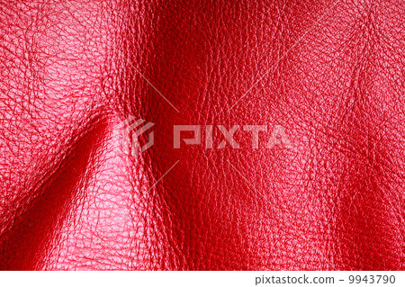Texture of folds vivid red skin leather background Texture of folds vivid red skin leather background 9943790