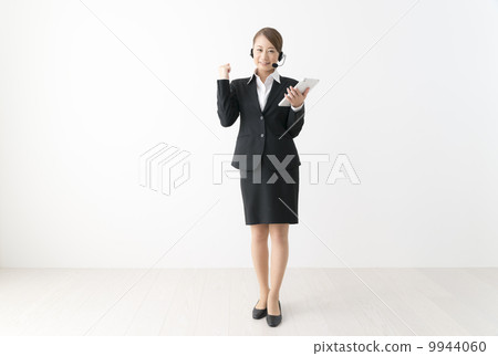 Female operator with tablet 9944060