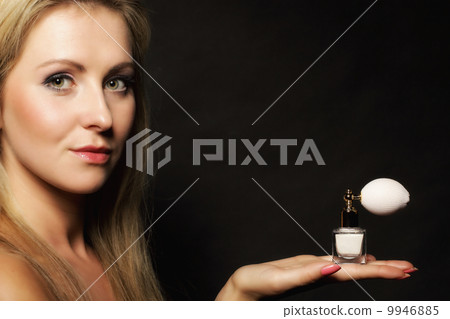 portrait beautiful woman with perfume bottle 9946885