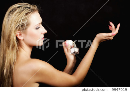 portrait beautiful woman with perfume bottle portrait beautiful woman with perfume bottle 9947019