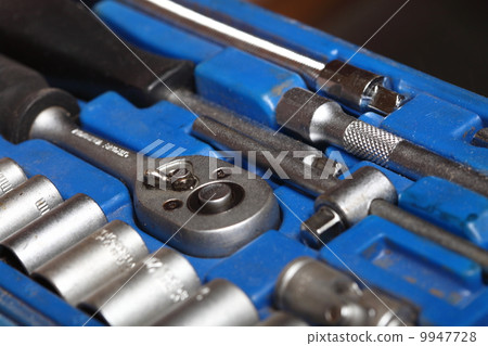 Closeup toolkit set tools in blue box 9947728