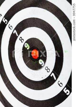 Closeup of old dirty black and white target as sport background Closeup of old dirty black and white target as sport background 9947755