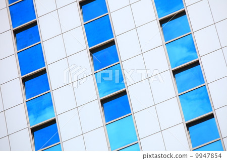Modern futuristic business building in city Modern futuristic business building in city 9947854