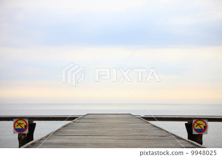old wooden pier at the sea 9948025