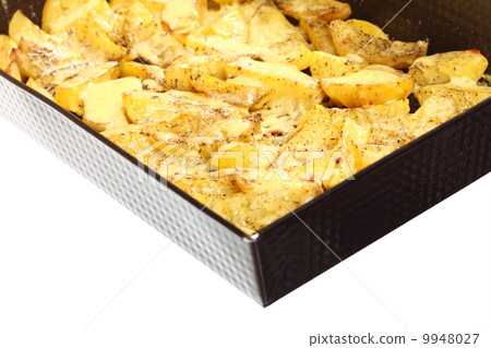 Roasted potatoes with spices and cheese Roasted potatoes with spices and cheese 9948027