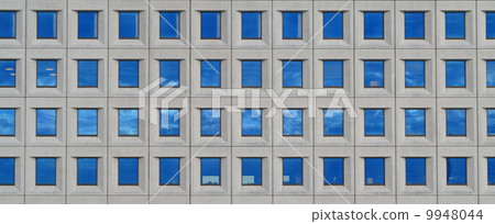 Modern futuristic business building in city 9948044