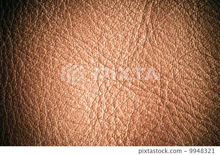 Brown textured leather grunge background closeup Brown textured leather grunge background closeup 9948321