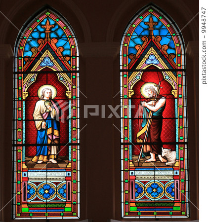 Catholic stained glass window from a church. 9948747