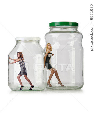 Woman in glass jar isolated on white Woman in glass jar isolated on white 9951080