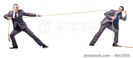 Man in tug of war concept on white Man in tug of war concept on white 9951083