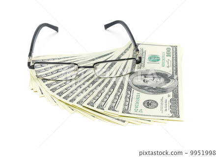 U.S. dollars and glasses isolated on white background U.S. dollars and glasses isolated on white background 9951998