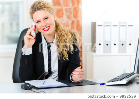 Lawyer in office sitting on the computer Lawyer in office sitting on the computer 9952559