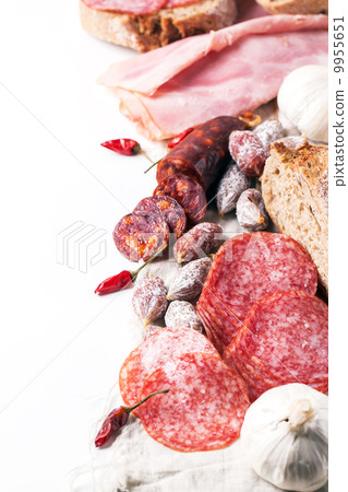 Sausages and chili peppers 9955651
