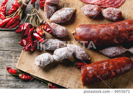 Sausages and chili peppers 9955671