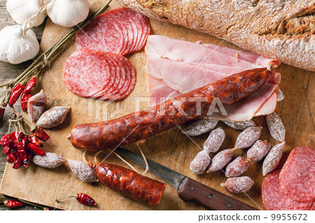 Sausages and chili peppers 9955672