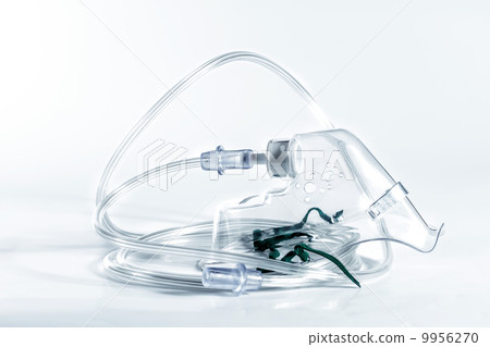 Monochrome image of an oxygen mask. Monochrome image of an oxygen mask. 9956270