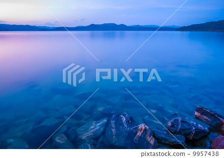 sunset during blue hour at the lake 9957438