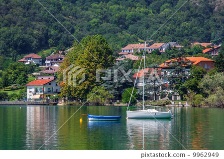 Yacht and small village on Lake Avigliana in Italy. 9962949