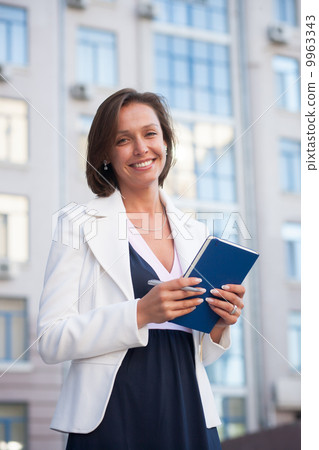 Businesswoman with notepad Businesswoman with notepad 9963343