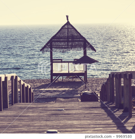 Boardwalk on beach 9969580